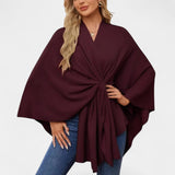 Daniela – Elegantti hulmuava ponchoneule solmulla