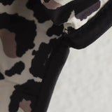 Marja – tikattu takki leopardivuorella