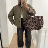 Marja – tikattu takki leopardivuorella