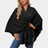 Daniela – Elegantti hulmuava ponchoneule solmulla