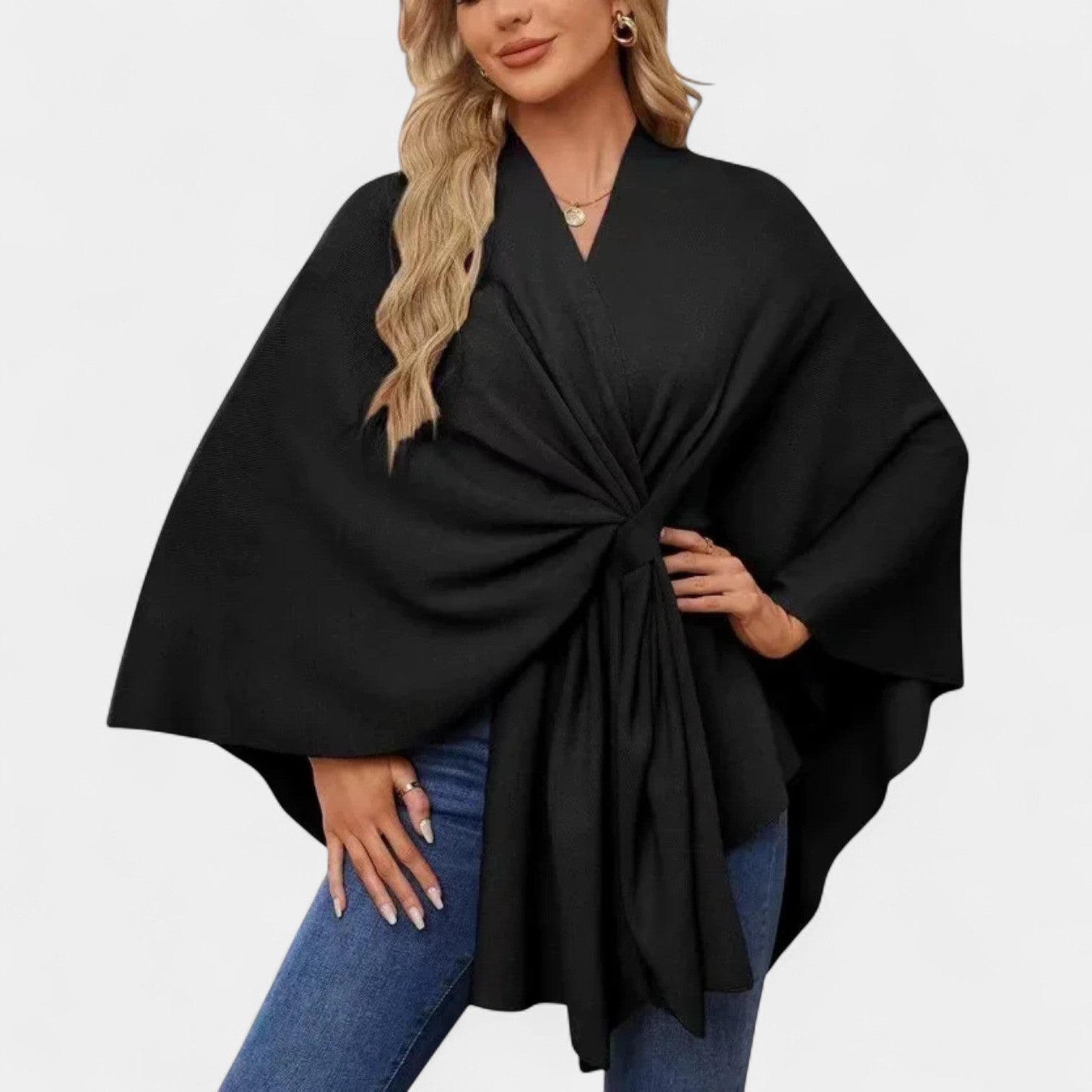 Daniela – Elegantti hulmuava ponchoneule solmulla