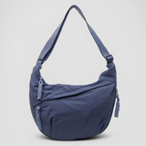 "Mara | Sininen Olkalaukku" could be rewritten as "Mara | Blue Shoulder Bag".