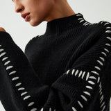 Alma | Oversize-pooloneule, jossa on Piqué-yksityiskohtia