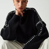 Alma | Oversize-pooloneule, jossa on Piqué-yksityiskohtia