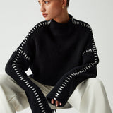 Alma | Oversize-pooloneule, jossa on Piqué-yksityiskohtia