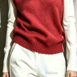 Milja – hihaton neuleliivi paljeteilla