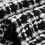 Kahden osan setti: ruudullinen tweed-bleiseri ja minihame