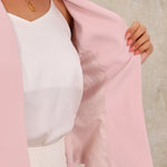 Kaulukseton peplum-jakku 3/4-hihoilla