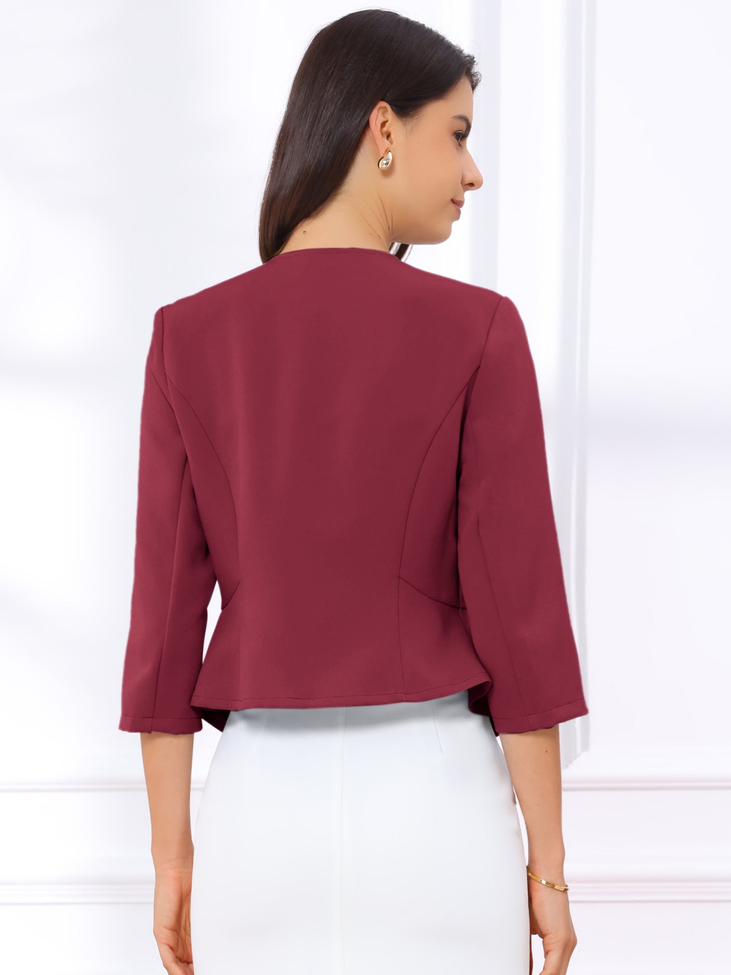 Kaulukseton peplum-jakku 3/4-hihoilla
